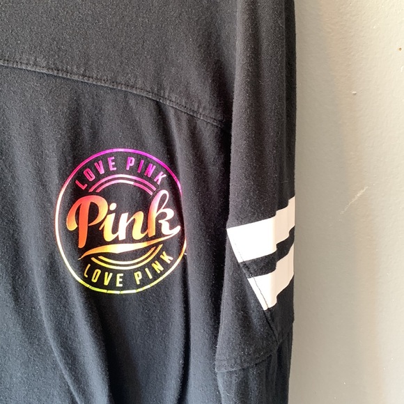 Pink varsity Black with multi color design and white stripe shirt. Size M. GUC - Picture 2 of 4